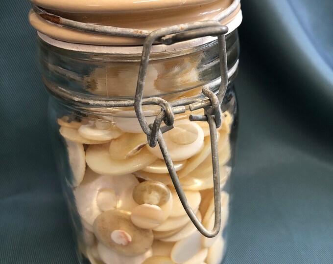 Glass Jar of vintage mother of pearl buttons