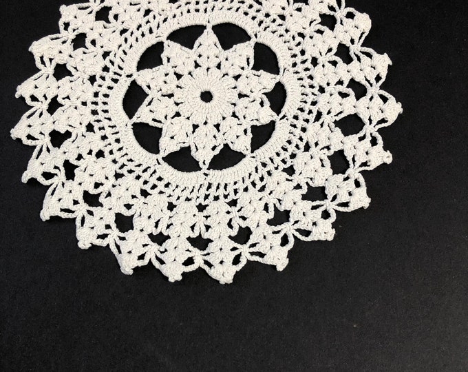 three different doilies