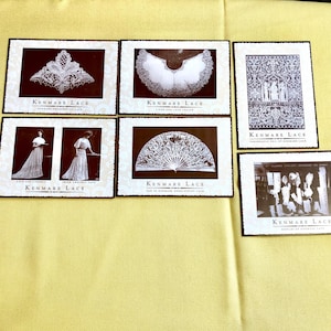 May include: Six black and white postcards showcasing various examples of Kenmare Lace. The postcards feature a range of lace designs, including a collar, a fan, and a traditional Irish design. The text on the postcards reads "Kenmare Lace" and includes the name of the specific design.