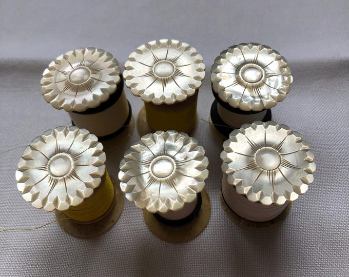 Mother of pearl thread spools