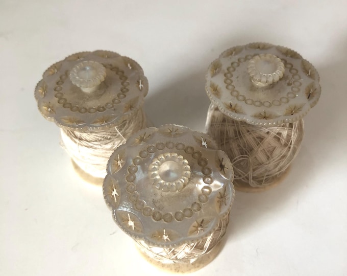 Mother of pearl thread spools