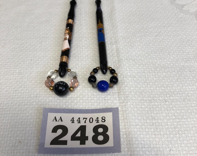 Pair of wooden lacemaking bobbins, Christmas