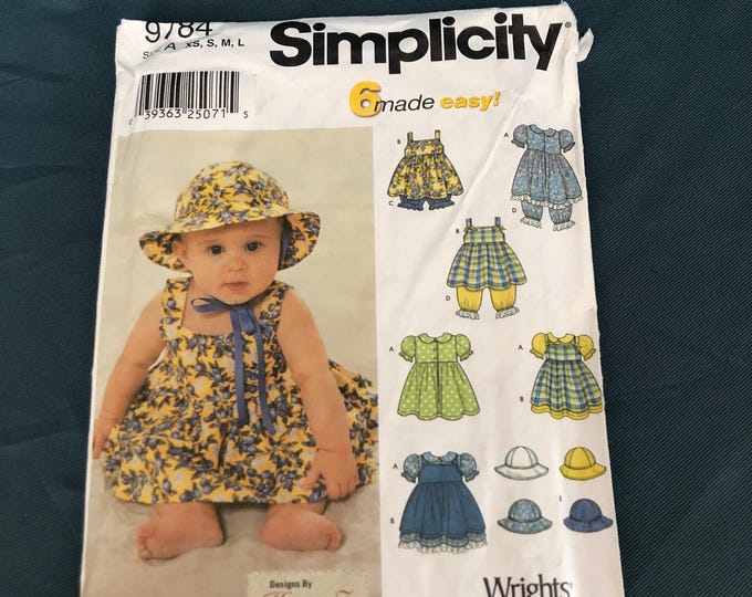 Babies dress, pinafore, panties, Pantaloons and hat paper Sewing Pattern, Factory Folded, Simplicity 9784