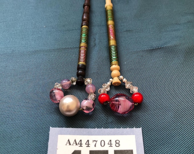 Lacemaking bobbins with foil and wire decoration