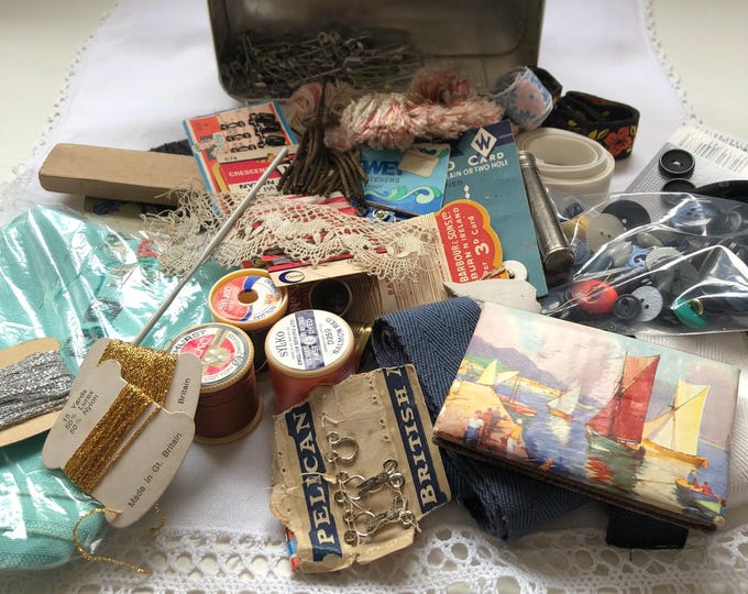 Vintage sewing kit in Polish chocolate tin