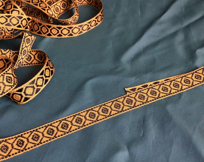 black and old gold upholstery trim