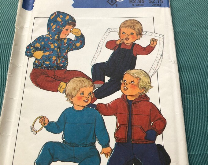 Childs, baby clothes paper pattern, factory folded, Style 3945