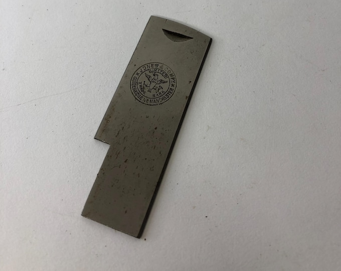 Jones serpentine sewing machine cloth plate slide