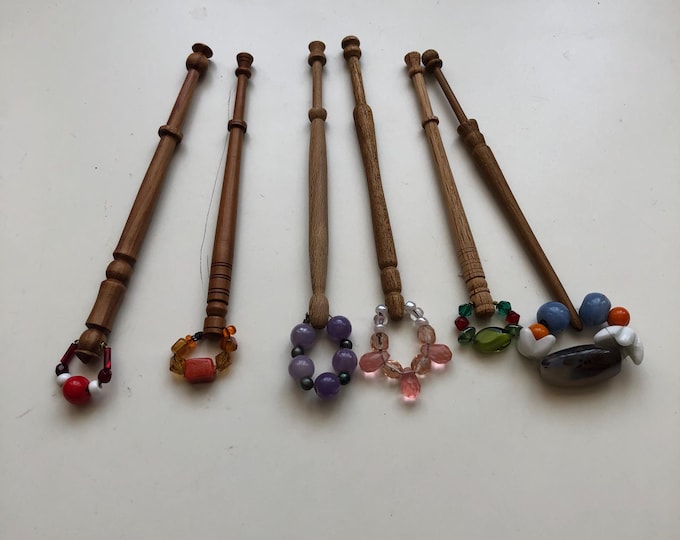 wooden lace bobbins with spangles