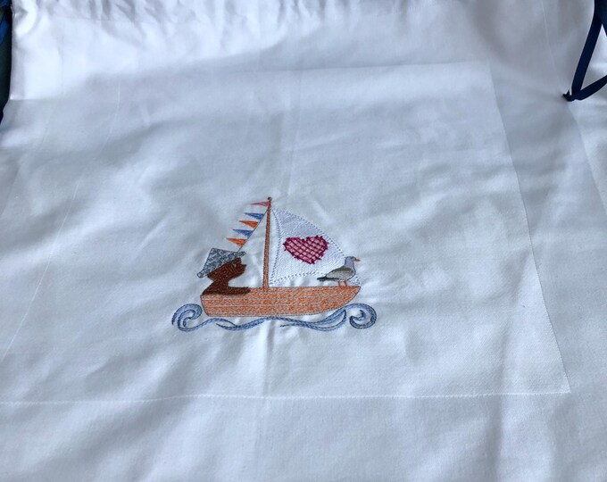 laundry bag,  Bear in a boat