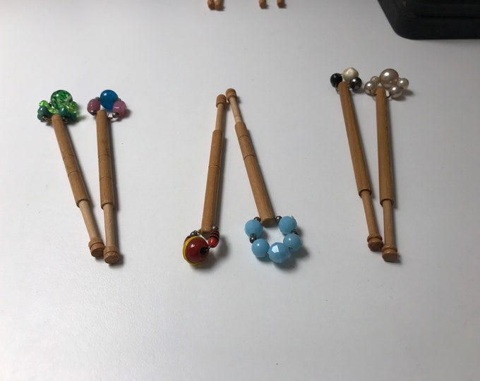 Wooden bobbins for lacemaking