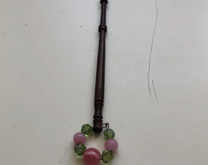 Single dark wood lace bobbin with spangles
