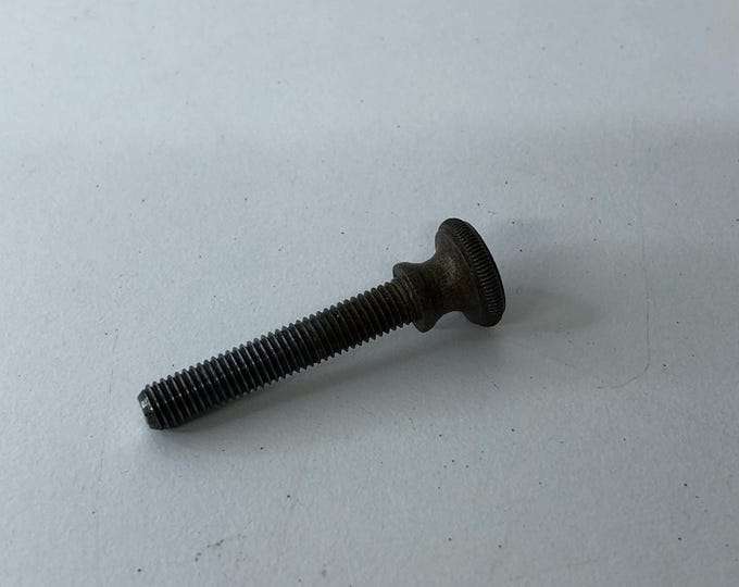 Jones serpentine sewing machine release catch screw