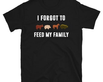 May include: Black t-shirt with the text "I forgot to feed my family" in white.  There are five animal-shaped candies in a row below the text.