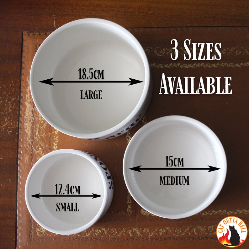 May include: Three white ceramic bowls in small, medium, and large sizes. The large bowl measures 18.5 cm, the medium bowl measures 15 cm, and the small bowl measures 12.4 cm in diameter. Text on the image reads 3 SIZES AVAILABLE and CAT OUTTA HELL.