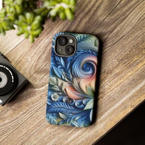 May include: A blue, green, and pink phone case with a floral design. The case has a raised camera bump with three lenses.