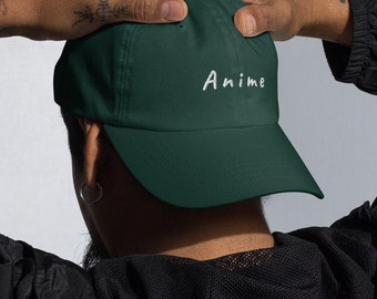 May include: A dark green baseball cap with the word "Anime" embroidered in white on the front.