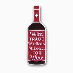 May include: Red wine bottle enamel pin with white text that reads "Will Trade Medical Advice For Wine".