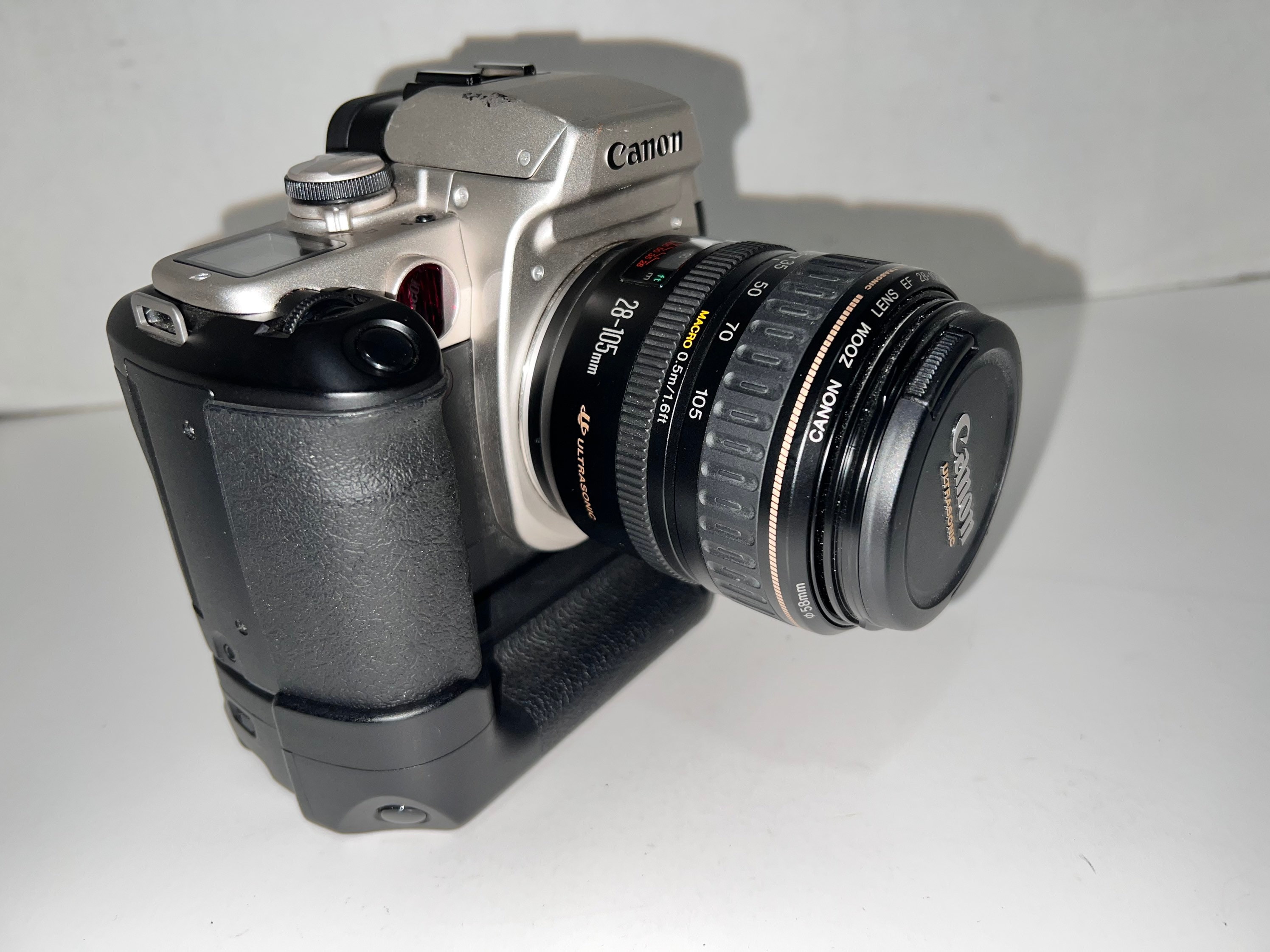 Cannon EOS Elan II E + Battery Pack + Lens Cannonef 28-105mm Cannon EOS Elan II E + Battery Pack + Lens Cannonef 28-105mm