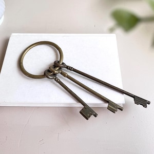 Vintage 1960s Brass Skeleton Keys On Ring, Set Of 3, MCM Mid Century Large Decor Keys