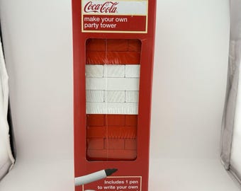 Juego Coca-Cola x Primark Crea tu propia torre de fiesta. Completo, nuevo y sellado.
