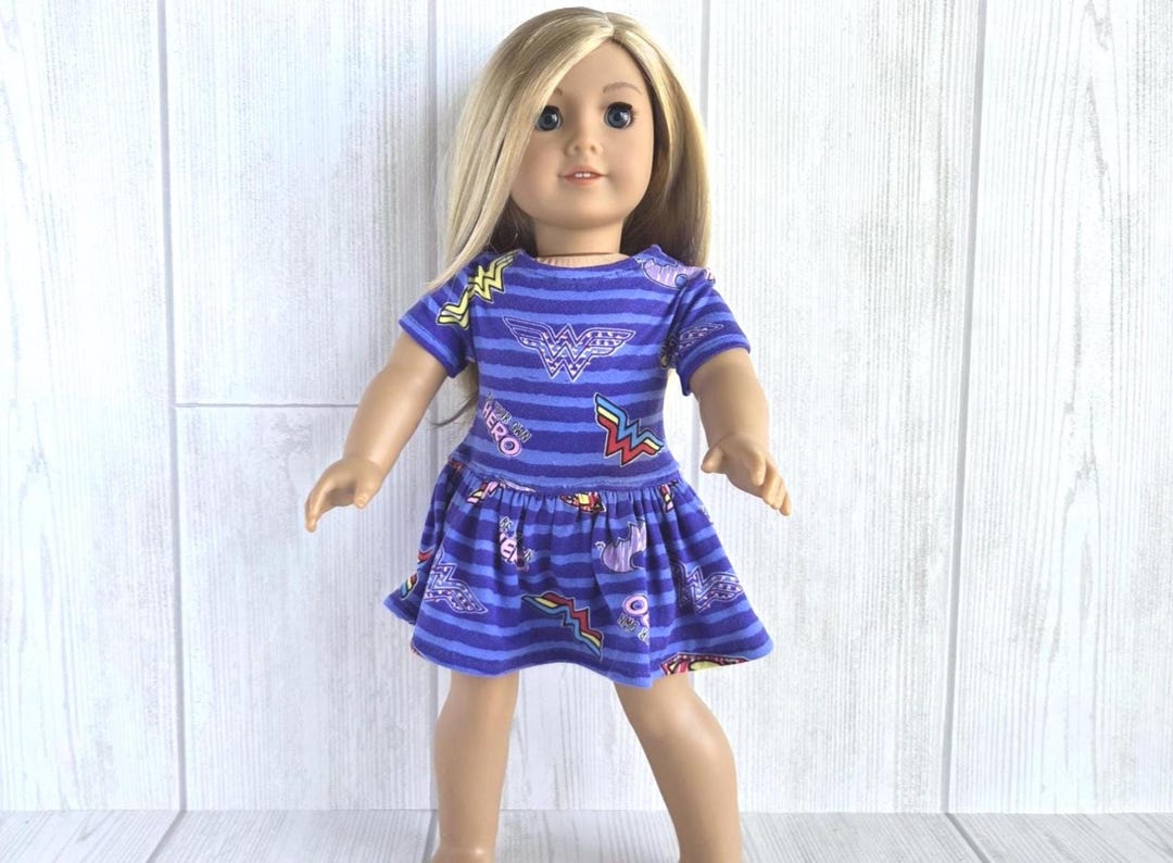 Blue Super Heroes Short Sleeve Dress With Pockets. Fits 18