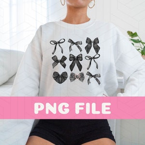 May include: White sweatshirt featuring a grid of nine black bow designs. The bows vary in style and size, with one featuring a heart-shaped embellishment. The text "PNG FILE" is displayed on a pink banner across the bottom of the image.