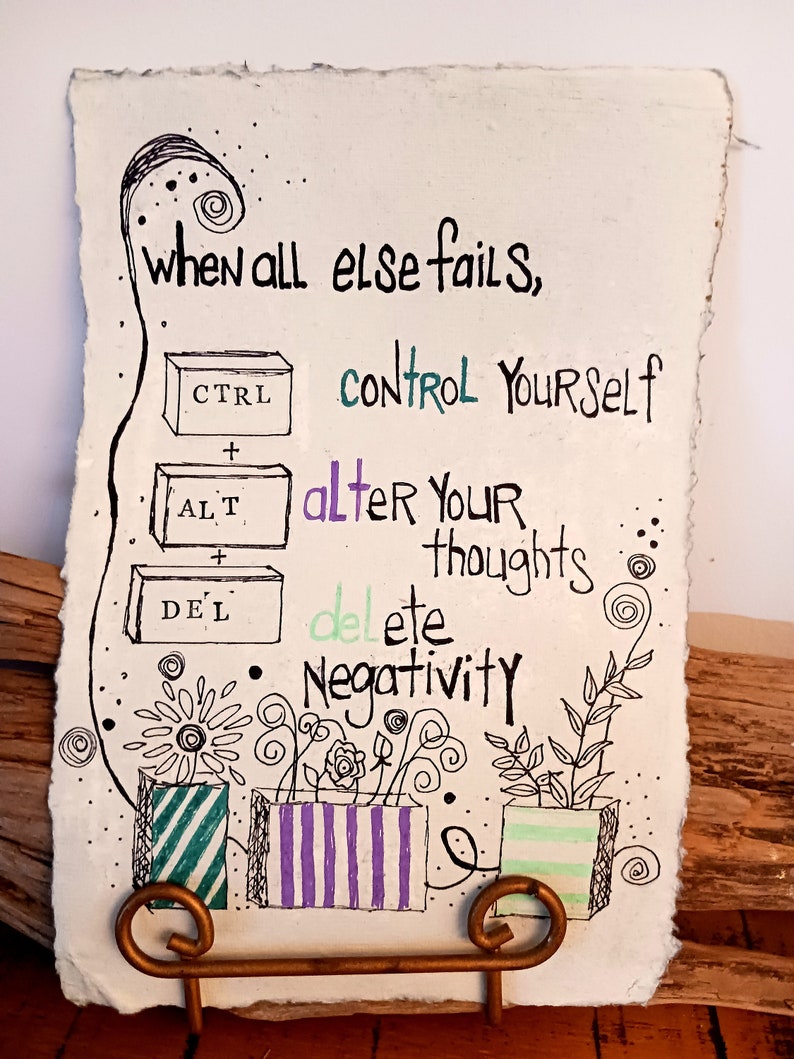 May include: A rectangular piece of textured paper featuring black ink illustrations and text. The text reads: when all else fails, control yourself, alter your thoughts, delete negativity. Three keyboard keys labeled CTRL, ALT, and DEL are drawn.