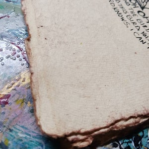 May include: A piece of off-white, textured paper with a rough, deckled edge. The paper features black printed text that reads, "OH OH AND THIS BIRD, YOU LORD KNOWS, I CAN'T". The surface of the paper has a visible grain and a fibrous appearance.