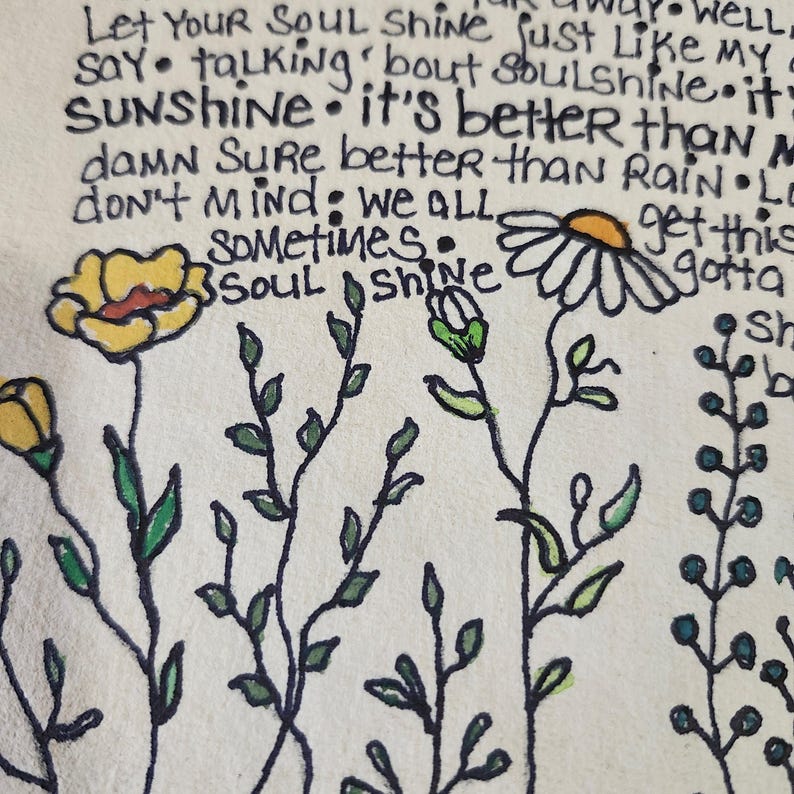 Pu&ograve; includere: Illustrazione a mano di fiori e foglie con il testo "Let Your Soul Shine just like my say. talking bout Soulshine. it's better than damn Sure better than Rain. Lo don't mind. we ALL, Sometimes. Soul Shine get this gotta Sh"