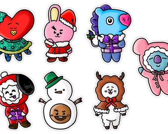 May include: A collection of seven colorful Christmas-themed character stickers. The stickers feature various cartoon figures, including a heart, a rabbit, a horse, a koala, a dog, a snowman, and a reindeer, all dressed in festive holiday attire.