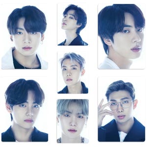 May include: A collage of seven portraits of men with different hairstyles and clothing. The men are all looking at the camera with serious expressions.