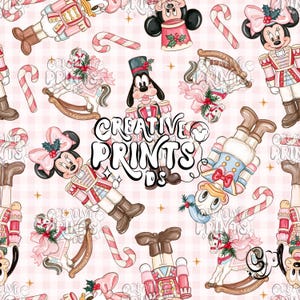 May include: A repeating pattern on a light pink gingham background featuring cartoon characters dressed as nutcrackers, rocking horses with holiday greenery, and candy canes. The text CREATIVE PRINTS DS is centered in black lettering.