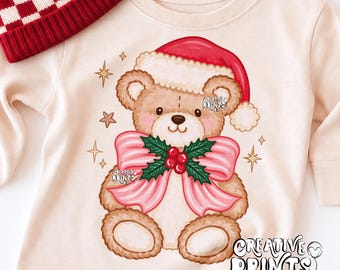 Oso de peluche navideño PNG, coqueta oso de peluche de Papá Noel con lazo rosa para sublimación, diseño de camiseta navideña, descarga de imágenes prediseñadas navideñas