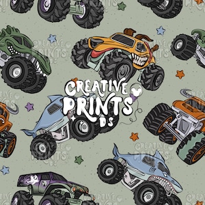 May include: A repeating pattern of cartoon monster trucks in various designs, including a dog, shark, and dinosaur. The trucks are in shades of orange, green, purple, and blue, with black tyres, set against a light green background with stars and the text "CREATIVE PRINTS DS".