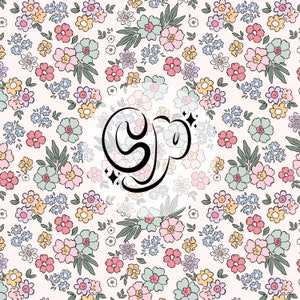 May include: A white background with a repeating pattern of small, colorful flowers. The word "Shop" is written in black cursive lettering in a circle in the center of the image.