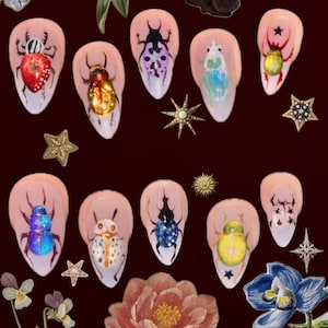 May include: A white ceramic mug with a black handle and the text "But First, Coffee" in a bold, black font. The mug is set against a neutral background, highlighting its simple design.