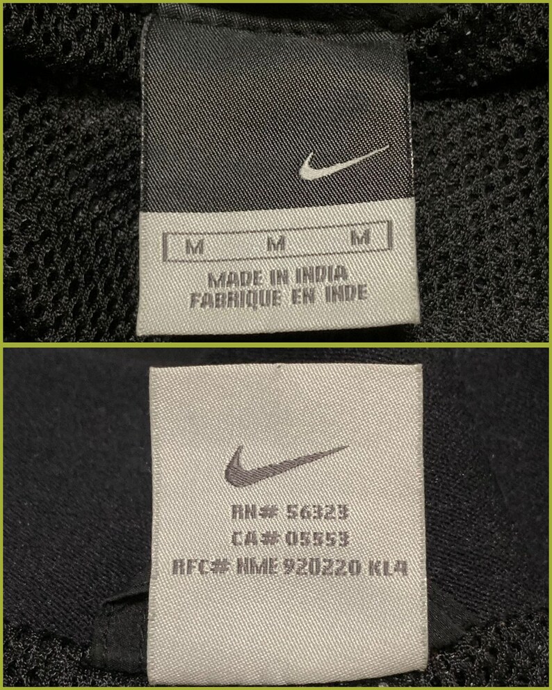 May include: White tag with black Nike swoosh logo and text "RN# 56323 CA# 05659 RFC# NME 920220 KL4".