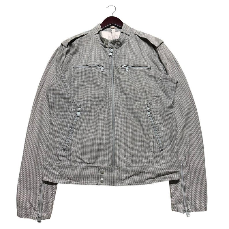 A vintage Diesel moto biker jacket with a checkered design featuring a full zip front, utility pockets and a streetwear aesthetic. Perfect for casual layering unisex fashion.