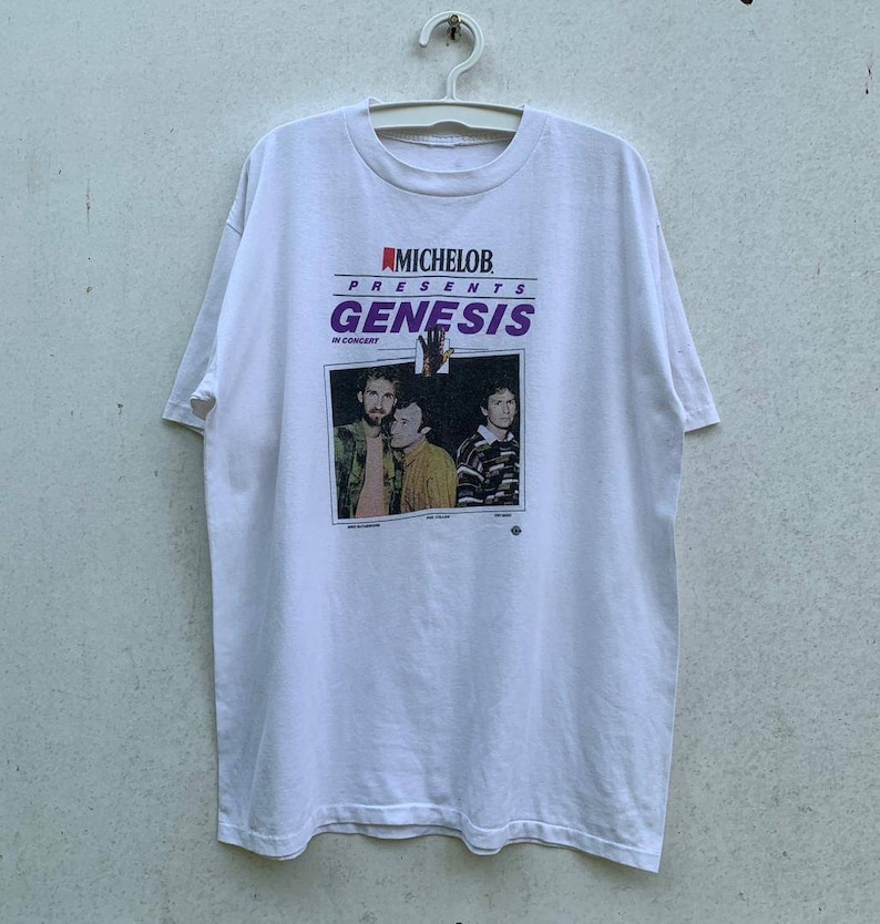 Vintage 80s Genesis Rock Band Tee Shirt 
80s Concert Michelob Tee Shirt
80s Michelob Beer Shirt
80s Band Tee Shirt
80s Vintage Rock Band Tee
80s Rock Tee Shirt Vintage
80s Graphic Tshirt
80s Retro Style Tee
80s Classic Tshirt
80s Music Shirt