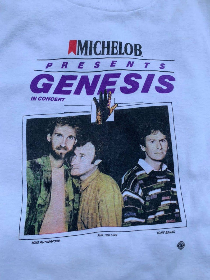Vintage 80s Genesis Rock Band Tee Shirt 
80s Concert Michelob Tee Shirt
80s Michelob Beer Shirt
80s Band Tee Shirt
80s Vintage Rock Band Tee
80s Rock Tee Shirt Vintage
80s Graphic Tshirt
80s Retro Style Tee
80s Classic Tshirt
80s Music Shirt