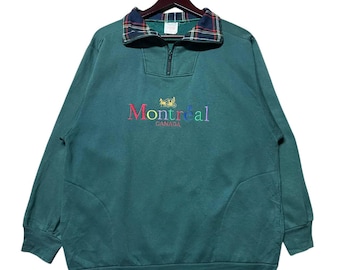 May include: A green sweatshirt with a plaid collar and a colorful embroidered logo that says "Montreal Canada".