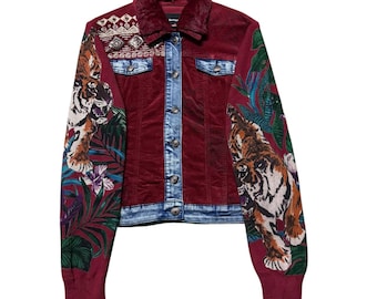 May include: A red corduroy jacket with a denim panel and tiger print sleeves. The jacket has a faux fur collar and a button closure.