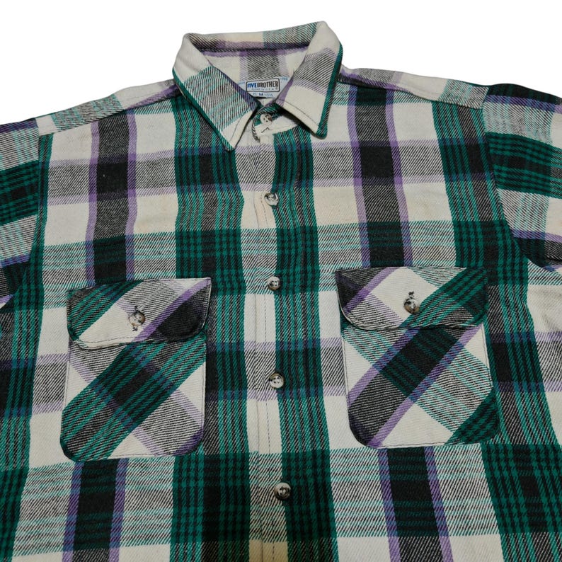 Vintage Five Brother flannel shirt made in USA with green black purple  and white plaid pattern, button down long sleeve cotton workwear top from the 1990s, classic outdoor style for men, grunge and streetwear fashion, warm fall winter shirt with dual chest pockets and durable construction, retro casual staple for collectors and flannel lovers.