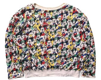 Vintage jaren 90 Disney Mickey Family omkeerbaar sweatshirt karakterprint helemaal patroon Walt Disney Company retro cartoon trui