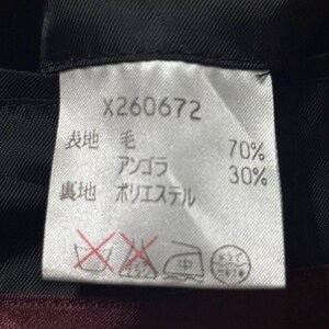 Vintage Mens black wool blend long overcoat featuring a minimalist button up design with stand collar made by A.A.R Durban Urban.Vintage coat ideal for fall and winter streetwear,office wear or layered casual looks.Classic and sleek,perfect for fashion forward individuals seeking timeless urban outerwear.This stylish trench style coat offers comfort,warmth and elegance for everyday city life or formal occasions.