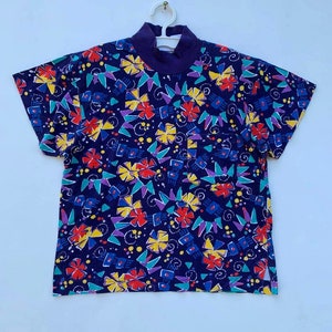 Vintage Nike Women All Over Print Tshirt Embroidered Logo Vintage Clothing