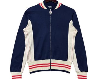 Chaqueta deportiva vintage FILA Bjorn Borg White Line. Ropa deportiva retro azul marino y blanca. Fabricada en Italia. Chaqueta deportiva vintage.