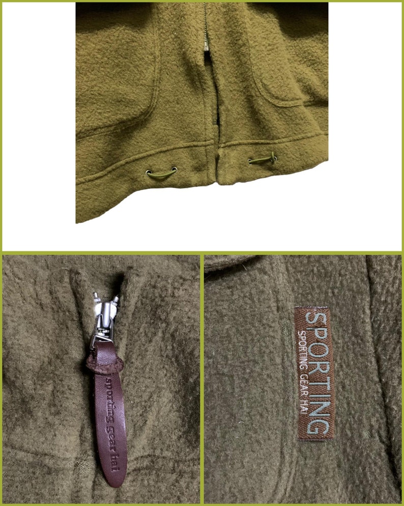 K&ouml;nnte beinhalten: Eine braune Fleecejacke mit Rei&szlig;verschluss und einem braunen Leder-Rei&szlig;verschluss-Zipper. Der Rei&szlig;verschluss-Zipper hat den Text "Sporting Gear Hai" darauf. Die Jacke hat einen Aufn&auml;her auf der Brust mit dem Text "Sporting Gear Hai" in wei&szlig;en Buchstaben auf braunem Hintergrund.
