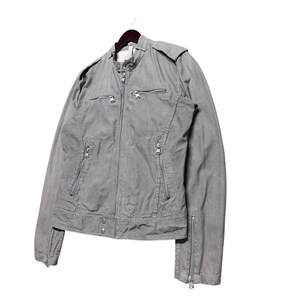 A vintage Diesel moto biker jacket with a checkered design featuring a full zip front, utility pockets and a streetwear aesthetic. Perfect for casual layering unisex fashion.